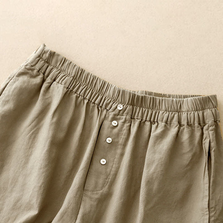 Buddha Stones Pantaloncini estivi minimalisti da donna con bottoni, elastico in vita e tasche. - image 2