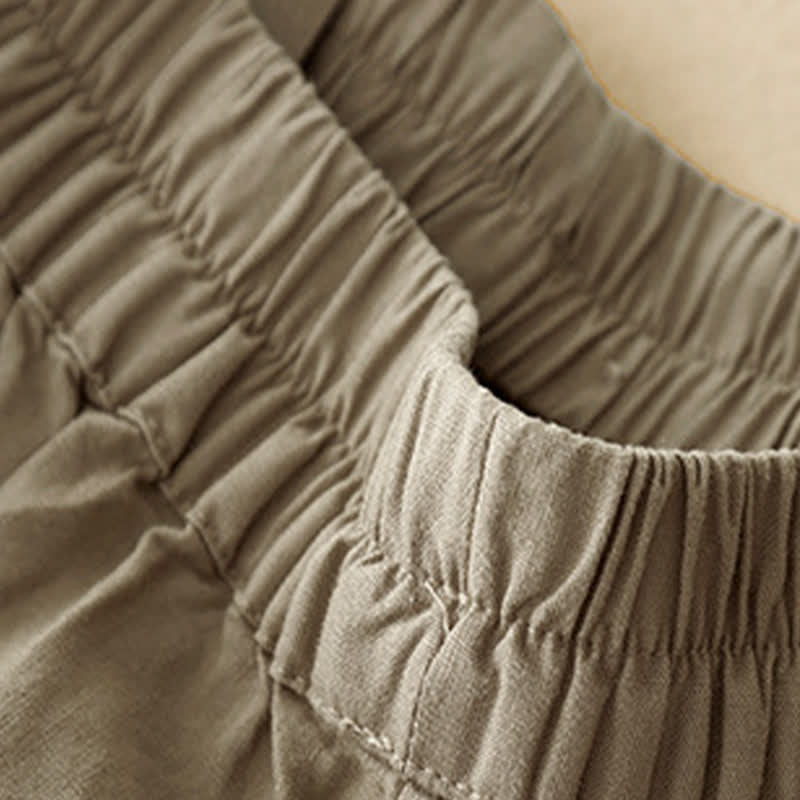 Buddha Stones Pantaloncini estivi minimalisti da donna con bottoni, elastico in vita e tasche. - image 3
