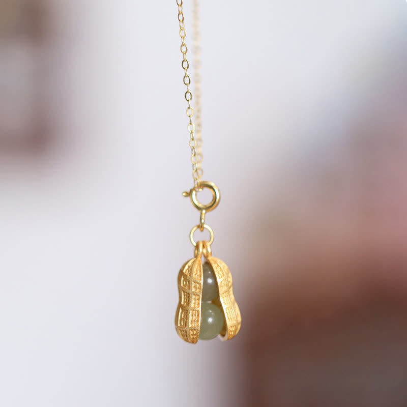 Buddha Stones Collana con ciondolo a forma di arachide in giada Hetian e argento sterling 925, con la scritta "Good Things Happen" (Le cose belle accadono) e simbolo di prosperità. - image 1