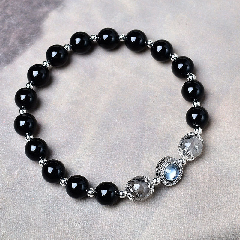 Buddha Stones Bracciale purificante in ossidiana nera con riflessi argentati e zirconi. - image 1