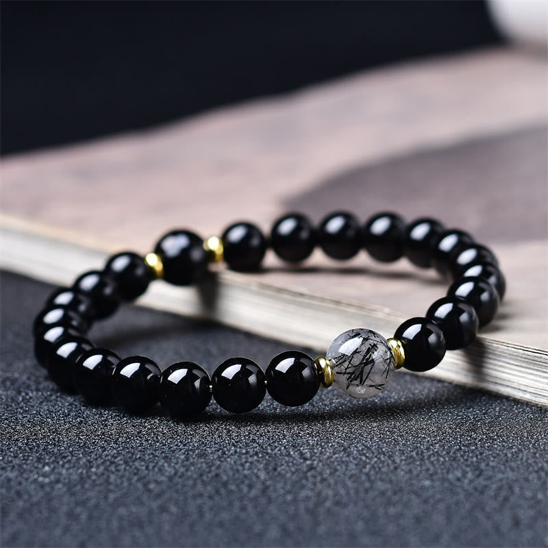 Buddha Stones Bracciale purificante in ossidiana nera naturale e quarzo rutilato nero - 10 mm (Circonferenza del polso: 16-17 cm) - image 0