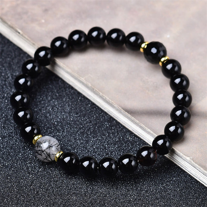 Buddha Stones Bracciale purificante in ossidiana nera naturale e quarzo rutilato nero - image 1