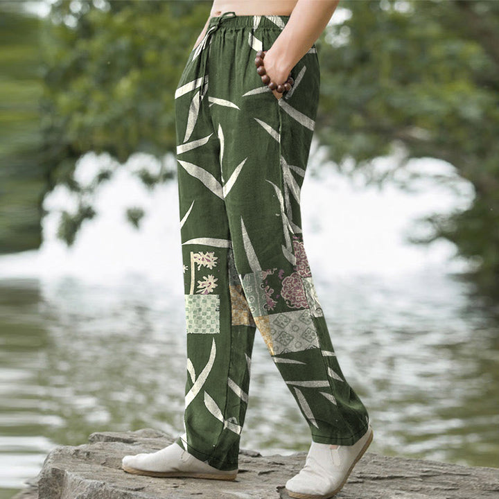 Buddha Stones Pantaloni da uomo affusolati con tasche, in cotone con motivo patchwork a foglie di bambù. - image 1
