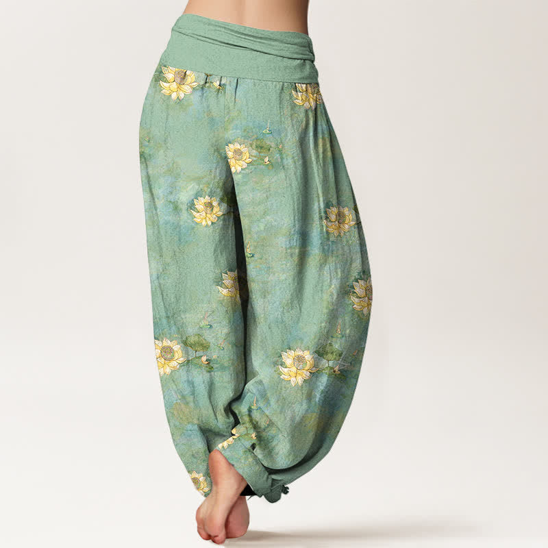Buddha Stones Pantaloni harem da donna in cotone giallo con motivo a fiori di loto e elastico in vita. - image 1