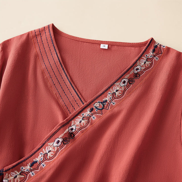 Camicia da donna a maniche lunghe con scollo obliquo e ricamo di fiori Buddha Stones, stile casual. - image 1