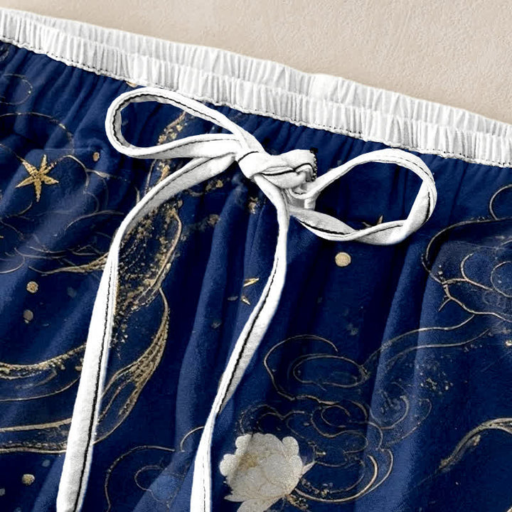 Buddha Stones Eleganti pantaloni da donna in puro cotone con motivo floreale e gru, vita elasticizzata e tasche. - image 1