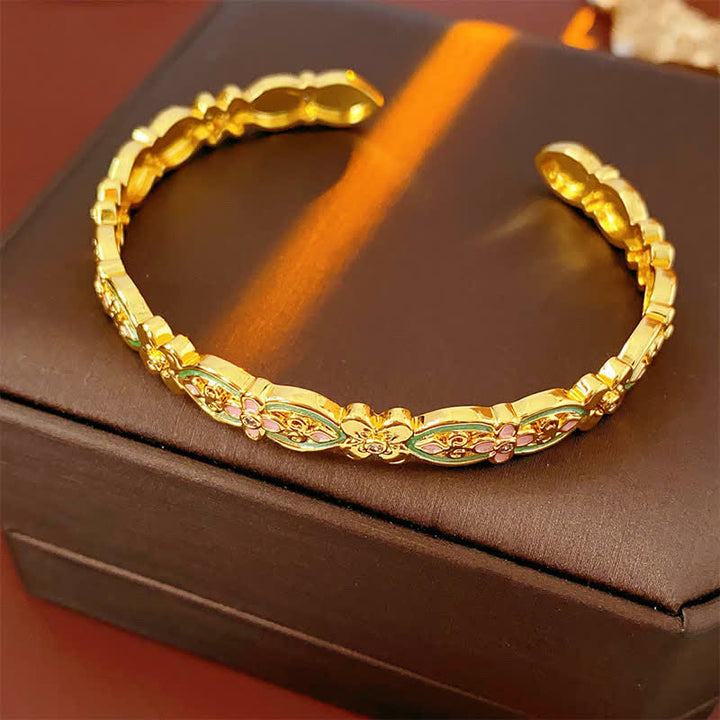 Buddha Stones Bracciale rigido con motivo floreale in rame smaltato. - image 1