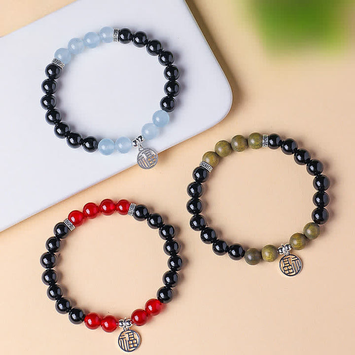 Buddha Stones Braccialetto portafortuna con perline e personaggio Fu in onice nera - image 20