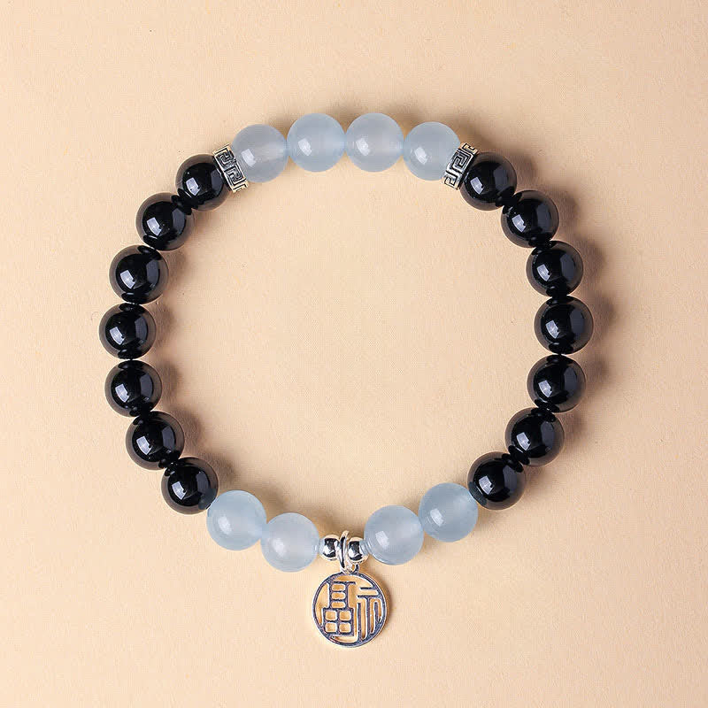 Buddha Stones Braccialetto portafortuna con perline e personaggio Fu in onice nera - Onice nero, calcedonio blu (circonferenza del polso: 15-16 cm) - image 12