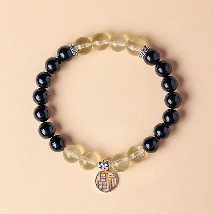Buddha Stones Braccialetto portafortuna con perline e personaggio Fu in onice nera - Onice nero e citrino (Circonferenza del polso: 15–16 cm) - image 1