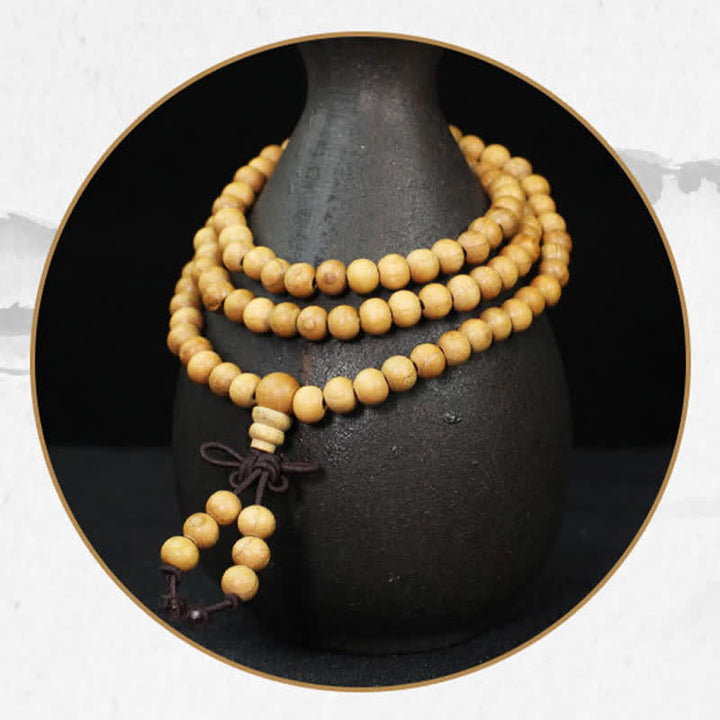 Buddha Stones Mala di 108 perle annodate e lucidate a mano in legno di pesco. - image 9