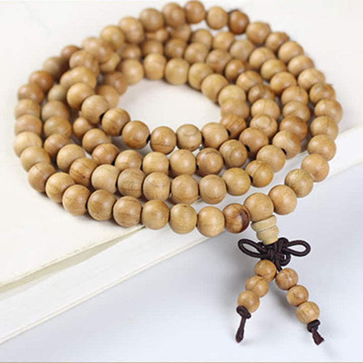 Buddha Stones Mala di 108 perle annodate e lucidate a mano in legno di pesco. - image 7