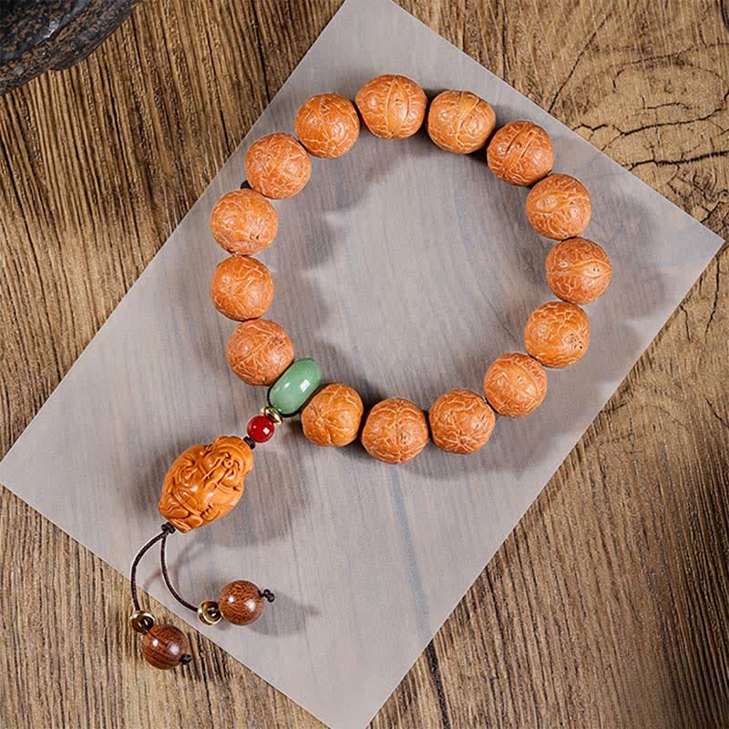 Buddha Stones Mala da polso etnico intagliato a mano con occhio di fenice e Bodhi della saggezza. - Mala da polso con occhio di fenice - 15 mm - Occhio di Fenice Bodhi (Protezione♥Saggezza) - image 0