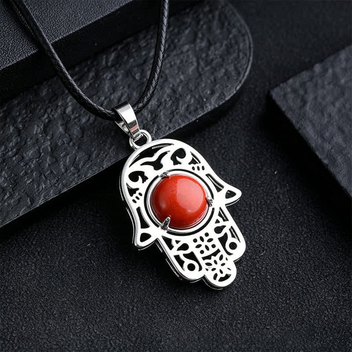 Buddha Stones Collana con intarsio in ossidiana nera naturale e palma Hamsa, simbolo di forza e resistenza. - Redstone naturale (il colore può variare) - image 12
