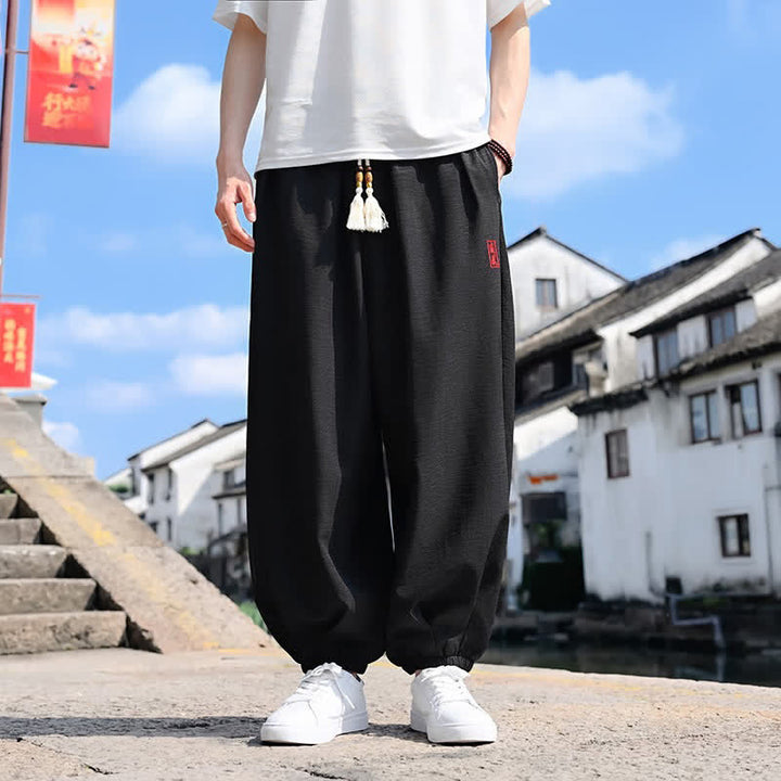 Buddha Stones Pantaloni harem da uomo estivi a tinta unita, lunghezza alla caviglia, con coulisse e tasche. - Nero - US/UK/AU46, EU56 (5XL) - image 0