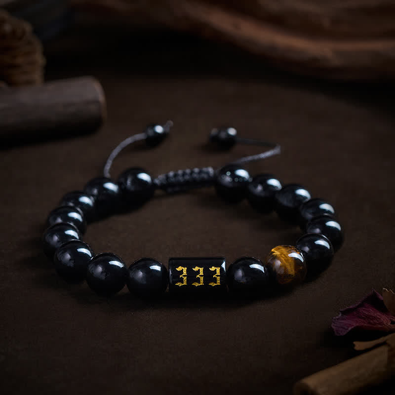 Buddha Stones Braccialetto con numero angelico, ossidiana nera naturale e occhio di tigre, simbolo di forza e realizzazione personale. - image 0