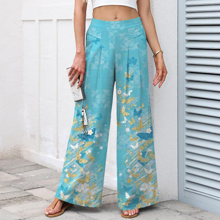Buddha Stones Pantaloni da donna in cotone e lino, stile bohémien, con elastico in vita e gamba larga, a fantasia floreale e farfalle dorate, con tasche. - image 1