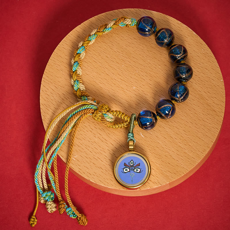 Buddha Stones Braccialetto con perline di vetro Liuli tibetano, cinque direzioni, divinità della ricchezza e occhio di Buddha, simbolo di benedizione. - Jambhala blu (circonferenza del polso 15-24 cm) - image 0