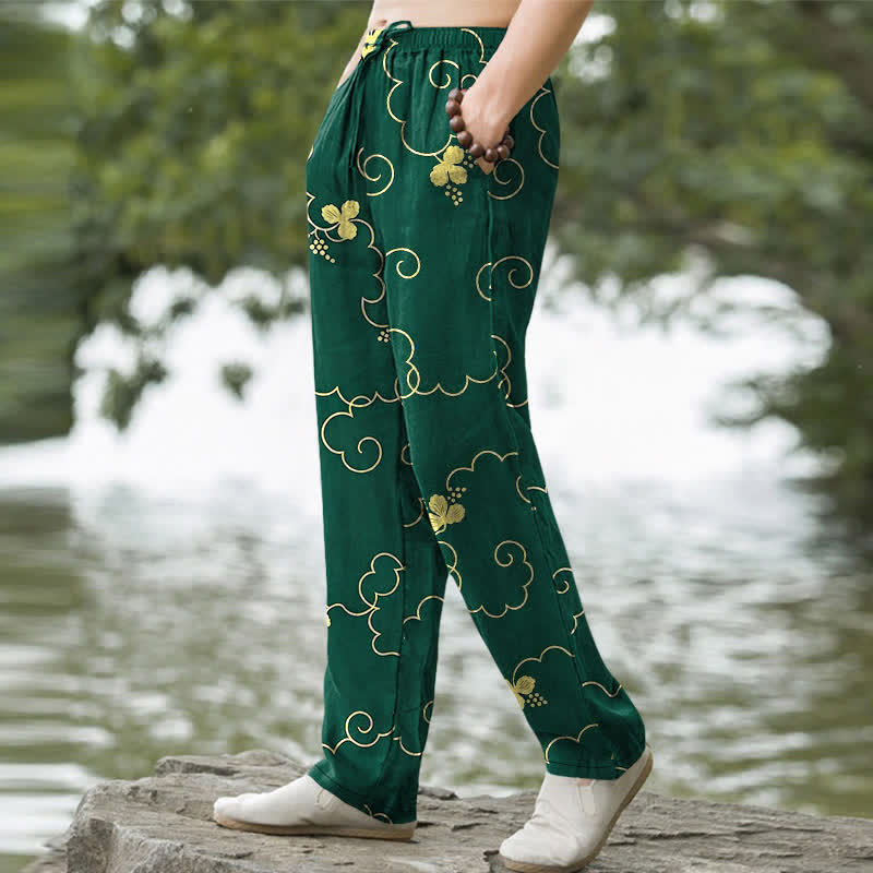 Buddha Stones Pantaloni da uomo affusolati in cotone con motivo floreale dorato e nuvole, con tasche. - image 1