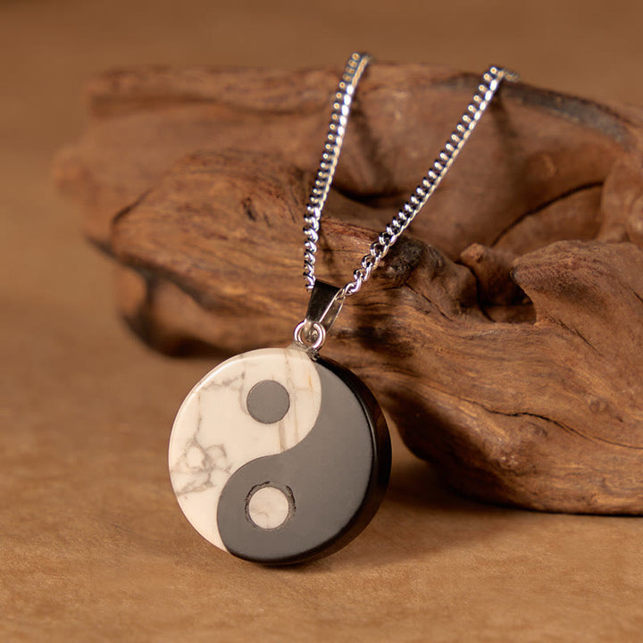 Buddha Stones Collana Yin Yang Tai Chi in ossidiana nera naturale e turchese bianco, simbolo di forza e resistenza. - image 1