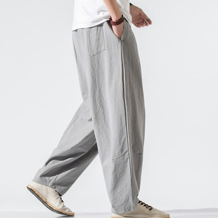 Buddha Stones Pantaloni lunghi estivi casual minimalisti da uomo con coulisse e elastico in vita, tinta unita, modello harem con tasche. - image 5