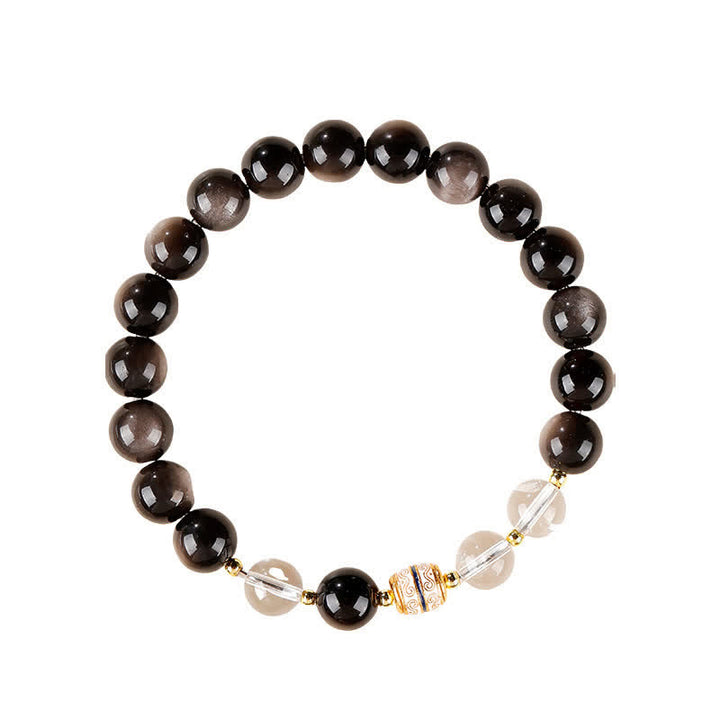 Buddha Stones Bracciale rotondo protettivo con perline Dzi in ossidiana con riflessi argentati. - image 11