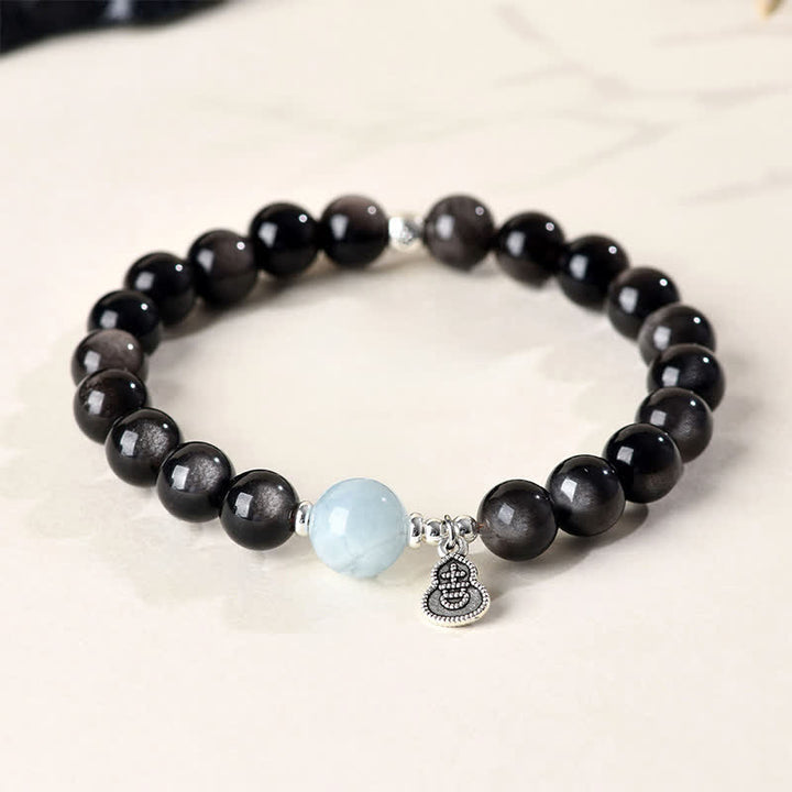 Buddha Stones Bracciale rotondo portafortuna a forma di zucca con ossidiana e acquamarina con riflessi argentati. - Ossidiana argentata (Protezione♥Lenitiva) - image 0