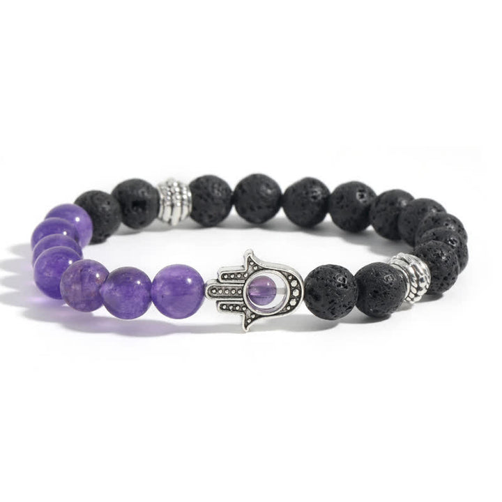 Buddha Stones Bracciale rotondo artigianale in pietra lavica con Hamsa per la protezione del palmo della mano (Hama). - Calcedonio viola e roccia lavica - image 9