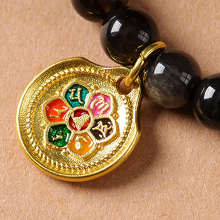 Buddha Stones Collana di perle intrecciate a mano con ciondolo a forma di Garuda in ossidiana con riflessi argentati, simbolo di protezione. - image 12