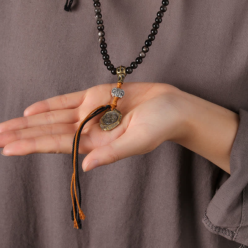 Buddha Stones Collana di perle intrecciate a mano con ciondolo a forma di Garuda in ossidiana con riflessi argentati, simbolo di protezione. - image 10