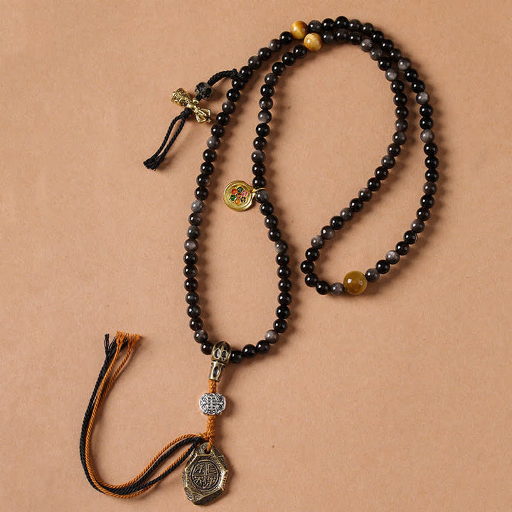Buddha Stones Collana di perle intrecciate a mano con ciondolo a forma di Garuda in ossidiana con riflessi argentati, simbolo di protezione. - image 4