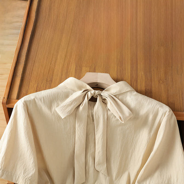 Buddha Stones Camicia estiva da donna a maniche corte con scollo rotondo, pieghe sul davanti, allacciatura laterale e spacco laterale. - image 3