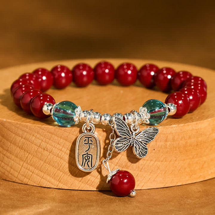 Buddha Stones Braccialetto "Amore" con farfalla in rame e cinabro - Cinabro (Circonferenza del polso: 15–16 cm) - image 0