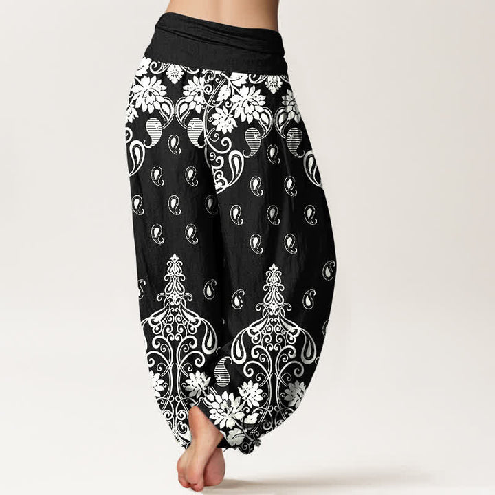 Buddha Stones Pantaloni harem da donna in puro cotone bianco con fantasia floreale paisley e vita elasticizzata. - image 9