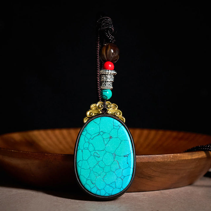 Buddha Stones Collana ovale tribale fatta a mano in legno di ebano con scritta "Saggezza" - Verde pavone - Legno d'ebano (Equilibrio♥Calma) - image 0