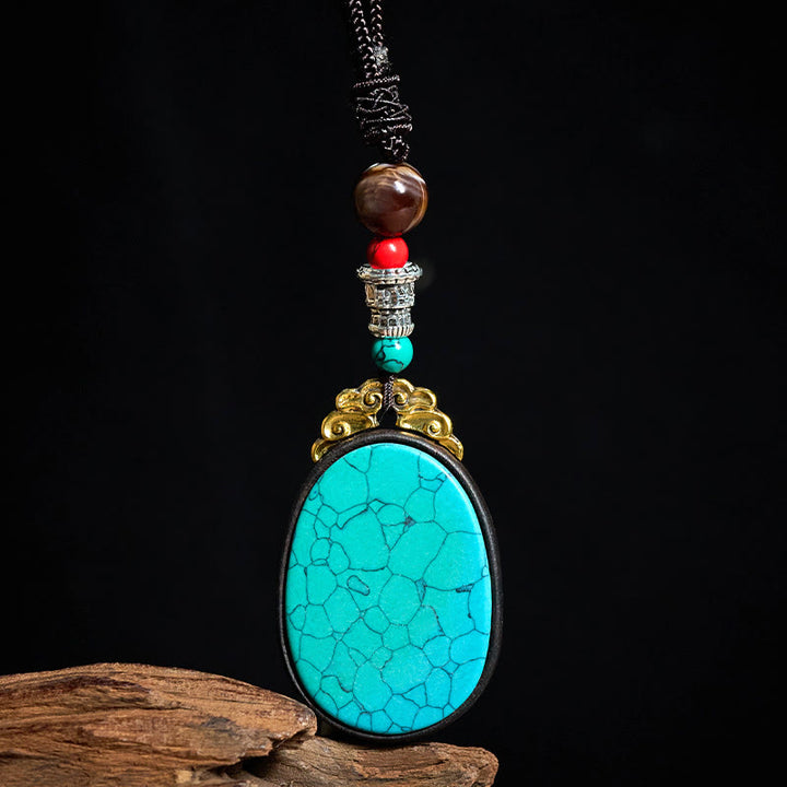 Buddha Stones Collana ovale tribale fatta a mano in legno di ebano con scritta "Saggezza" - image 3
