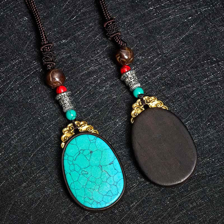 Buddha Stones Collana ovale tribale fatta a mano in legno di ebano con scritta "Saggezza" - image 11