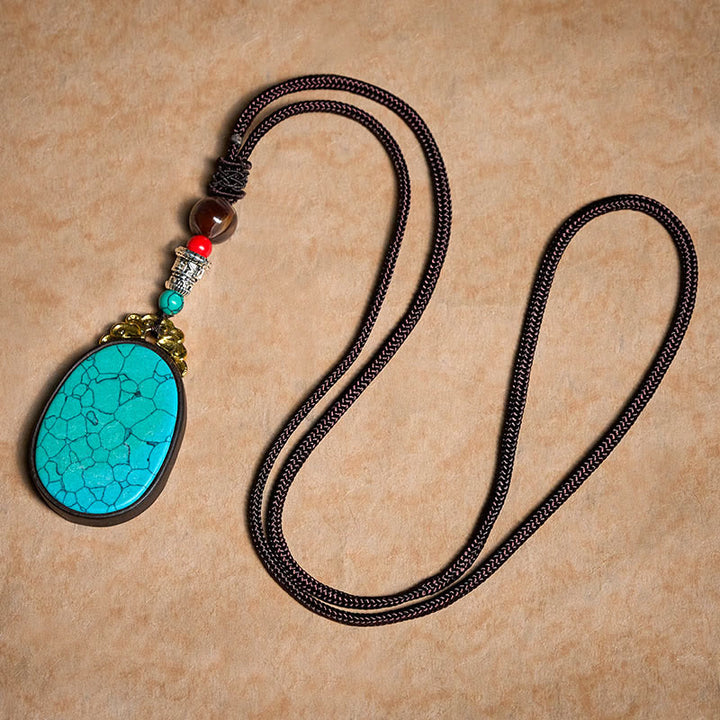 Buddha Stones Collana ovale tribale fatta a mano in legno di ebano con scritta "Saggezza" - image 9