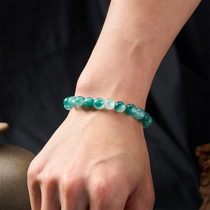 Buddha Stones Bracciale rotondo con perline blu e motivo floreale in calcedonio bianco e scritta "Equilibrio Emozionale" - image 4