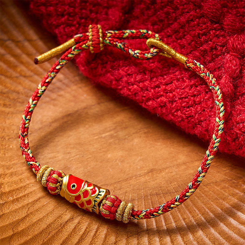 Buddha Stones Braccialetto di protezione con fiori e pesci koi, intrecciato a mano con cordino rosso. - Rosso - Con accessorio per pesci koi - image 0