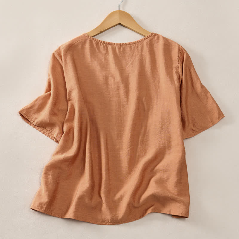 Buddha Stones T-shirt da donna a maniche corte, stile casual estivo, minimalista, con scollo a V e bottoni decorativi. - image 1
