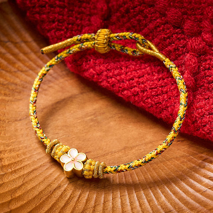 Buddha Stones Braccialetto giallo intrecciato con fiore e radicamento - Giallo - Con accessorio a forma di fiore bianco - image 0