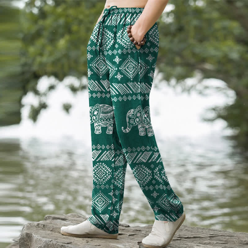 Buddha Stones Pantaloni da uomo affusolati in cotone con motivo tribale a elefanti e tasche. - image 1