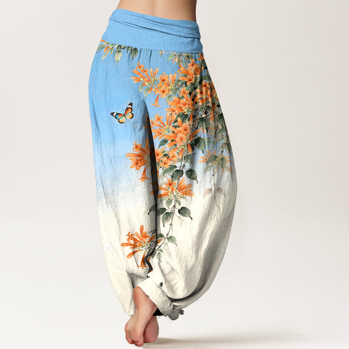 Buddha Stones Pantaloni harem da donna in cotone arancione con fantasia floreale e farfalle, vita elasticizzata. - image 2