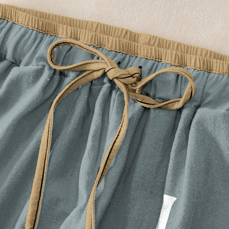 Buddha Stones Pantaloni da donna in puro cotone con elastico in vita e tasche, con stampa "Love OM". - image 1