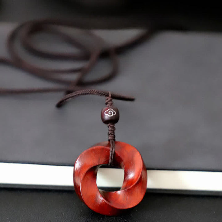 Buddha Stones Collana con ciondolo a forma di nodo infinito e corda dell'eternità in legno di sandalo rosso - image 3