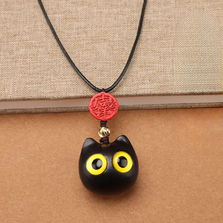 Buddha Stones Collana regolabile con gatto portafortuna in legno di ebano e sandalo rosso. - image 3