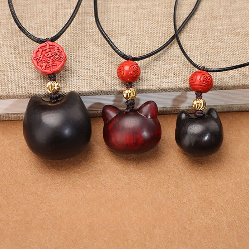Buddha Stones Collana regolabile con gatto portafortuna in legno di ebano e sandalo rosso. - image 22