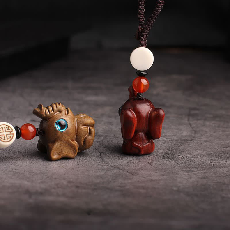 Buddha Stones Portachiavi intrecciati in legno di sandalo verde con scritta "Strength" - image 11