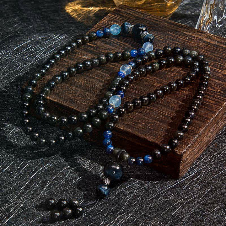 Mala artigianale con 108 perline e nappa rotonda in ossidiana nera Buddha Stones per la protezione. - image 1